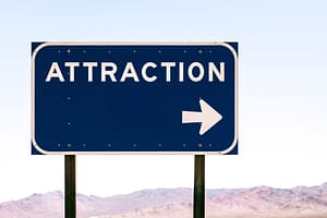 Blue sign with arrow showing attraction, 3 Law of Attraction Exercises